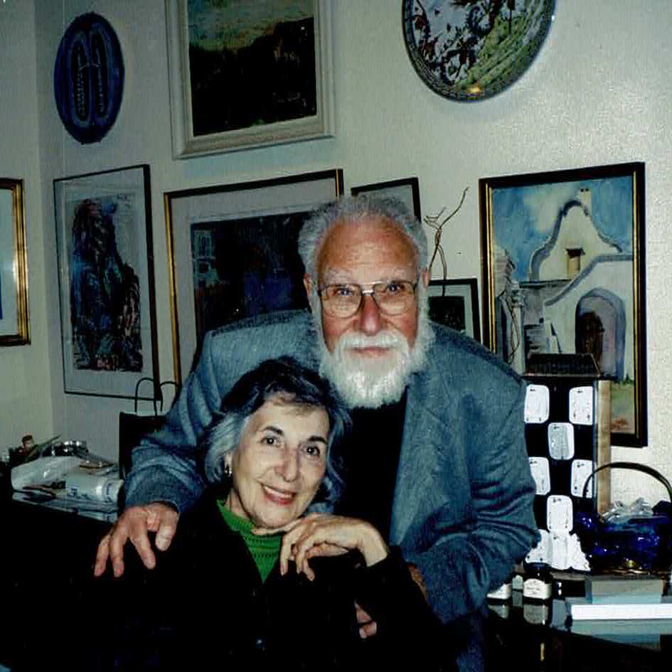 Miriam and Robert Rothman in front of some of their collection of Jewish works of art